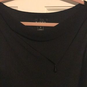 Elegant asymmetric black dress with fun neckline